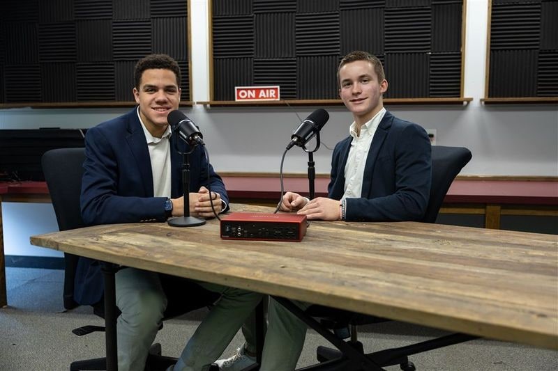 Charlie Martin and Jack Nelson, hosts of The Late Start Show, talking.